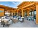 Outdoor patio with fire pit and comfortable seating at 1165 Sugarloaf Ln, Erie, CO 80516