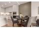 Kitchen features a dining area with round table and four gray chairs at 1901 Wazee St # 719, Denver, CO 80202