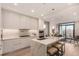 Modern kitchen with island, stainless steel appliances, and quartz countertops at 1901 Wazee St # 719, Denver, CO 80202