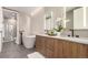 Luxurious bathroom with a freestanding tub, double vanity, and a walk-in shower at 1901 Wazee St # 719, Denver, CO 80202