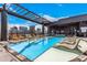 Rooftop swimming pool with lounge chairs and city views at 1901 Wazee St # 719, Denver, CO 80202