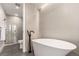 Modern bathroom featuring a soaking tub, walk-in shower, and stylish fixtures at 1901 Wazee St # 719, Denver, CO 80202