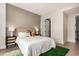 Modern bedroom with a queen-size bed, ample closet space and a neutral color palette at 1901 Wazee St # 719, Denver, CO 80202