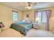 Spacious bedroom with a king-size bed and large windows at 11 Granite Dr, Boulder, CO 80302