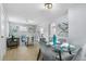 Bright and spacious living area with a dining area at 4424 Decatur St, Denver, CO 80211