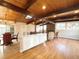 Dining area with hardwood floors and modern lighting at 6352 Kendall St, Arvada, CO 80003