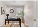 Home office with hardwood floors and antique chair at 3420 N Adams St, Denver, CO 80205