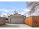 Detached garage with double doors and driveway access at 3420 N Adams St, Denver, CO 80205