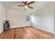 Cozy bedroom with wood-look flooring and ceiling fan at 1150 Golden Cir # 205, Golden, CO 80401