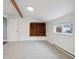 Bedroom with built-in shelving and window at 2001 Gray St, Edgewater, CO 80214