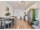 Open concept dining area with kitchen and living room views at 1590 Ingalls St # 202, Lakewood, CO 80214