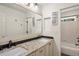 Clean bathroom with double vanity and shower/tub combo at 1194 W 125Th Dr, Denver, CO 80234