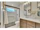 Elegant bathroom with double vanity and a walk-in shower at 1304 Snowberry Ln # 102, Louisville, CO 80027