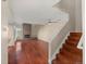 Living room with hardwood floors, fireplace and staircase at 2152 S Victor St # F, Aurora, CO 80014