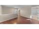 Upper level hallway with hardwood floors and access to bathroom at 2152 S Victor St # F, Aurora, CO 80014