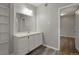 Clean bathroom with white vanity and tiled shower/tub at 756 Inca St, Denver, CO 80204