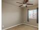 Spacious bedroom with ceiling fan and window at 18189 E Saskatoon Pl, Parker, CO 80134