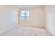 Bright bedroom with neutral carpeting and mountain view at 11206 Bright Sky Cir, Littleton, CO 80125