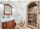 Basement bathroom with walk-in shower and tiled flooring at 8436 W Quarles Pl, Littleton, CO 80128