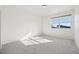 Bright bedroom with large window and carpeted floor at 722 Washington Ave # 201, Golden, CO 80401