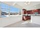 Modern kitchen with dark wood cabinets and mountain views at 722 Washington Ave # 201, Golden, CO 80401