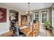 Spacious dining room featuring a large wooden table and scenic views at 1055 Divide View Dr, Golden, CO 80403