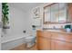 Clean bathroom with light wood vanity and bathtub at 1196 N Grant St # 407, Denver, CO 80203