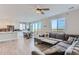 Open concept kitchen with white cabinets and a large island at 6645 Dry Fork Dr, Frederick, CO 80516