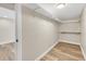 Basement closet with built-in shelving at 1755 E 96Th Way, Thornton, CO 80229