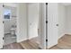 Simple bathroom with gray tile floors and white fixtures at 1755 E 96Th Way, Thornton, CO 80229