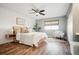 Bright bedroom with wood-look floors and ample closet space at 2105 Coronado Pkwy # C, Denver, CO 80229
