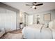 Main bedroom with walk-in closet and built-in shelves at 2105 Coronado Pkwy # C, Denver, CO 80229