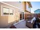 Private patio with seating area and adjacent to the home at 2105 Coronado Pkwy # C, Denver, CO 80229