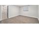 Bedroom with carpet flooring, closet and window with blinds at 7285 S Titus Way, Aurora, CO 80016