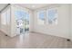Living room with sliding glass doors leading to the backyard, perfect for indoor-outdoor living at 7285 S Titus Way, Aurora, CO 80016