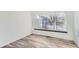Spacious office with large window and wood-look flooring at 2078 Gold Finch Ct, Longmont, CO 80503