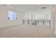 Spacious loft area with a modern railing overlooking the lower level at 11575 Toccata Trl, Parker, CO 80134