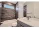 Bathroom with a tub, shower, and modern vanity at 11575 Toccata Trl, Parker, CO 80134