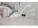 Bright living room featuring hardwood floors and a fireplace at 11575 Toccata Trl, Parker, CO 80134