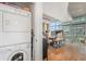 Convenient in-unit laundry with stacked washer and dryer at 1700 Bassett St # 903, Denver, CO 80202