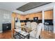 Modern kitchen with glass table and black tile backsplash at 1700 Bassett St # 903, Denver, CO 80202