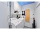 Convenient laundry room with washer, dryer, and storage cabinets at 1610 Little Raven St # 407, Denver, CO 80202