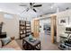 Living room with a ceiling fan and city views at 1610 Little Raven St # 407, Denver, CO 80202