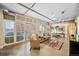 Luminous living room with floor to ceiling windows and city views at 1610 Little Raven St # 407, Denver, CO 80202