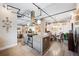 Modern kitchen with granite countertops and stainless steel appliances at 1610 Little Raven St # 407, Denver, CO 80202