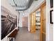 Bright entryway with wood floors and large artwork at 1610 Little Raven St # 407, Denver, CO 80202