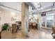Kitchen and dining area with exposed ductwork and concrete floors at 1610 Little Raven St # 407, Denver, CO 80202