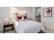 Bedroom with queen bed, en-suite bathroom access at 15881 Willow Way, Thornton, CO 80602
