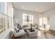 Bright and airy living room with ample natural light at 15881 Willow Way, Thornton, CO 80602