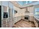 Modern kitchen featuring stainless steel appliances and white cabinets at 914 Main St, Georgetown, CO 80444